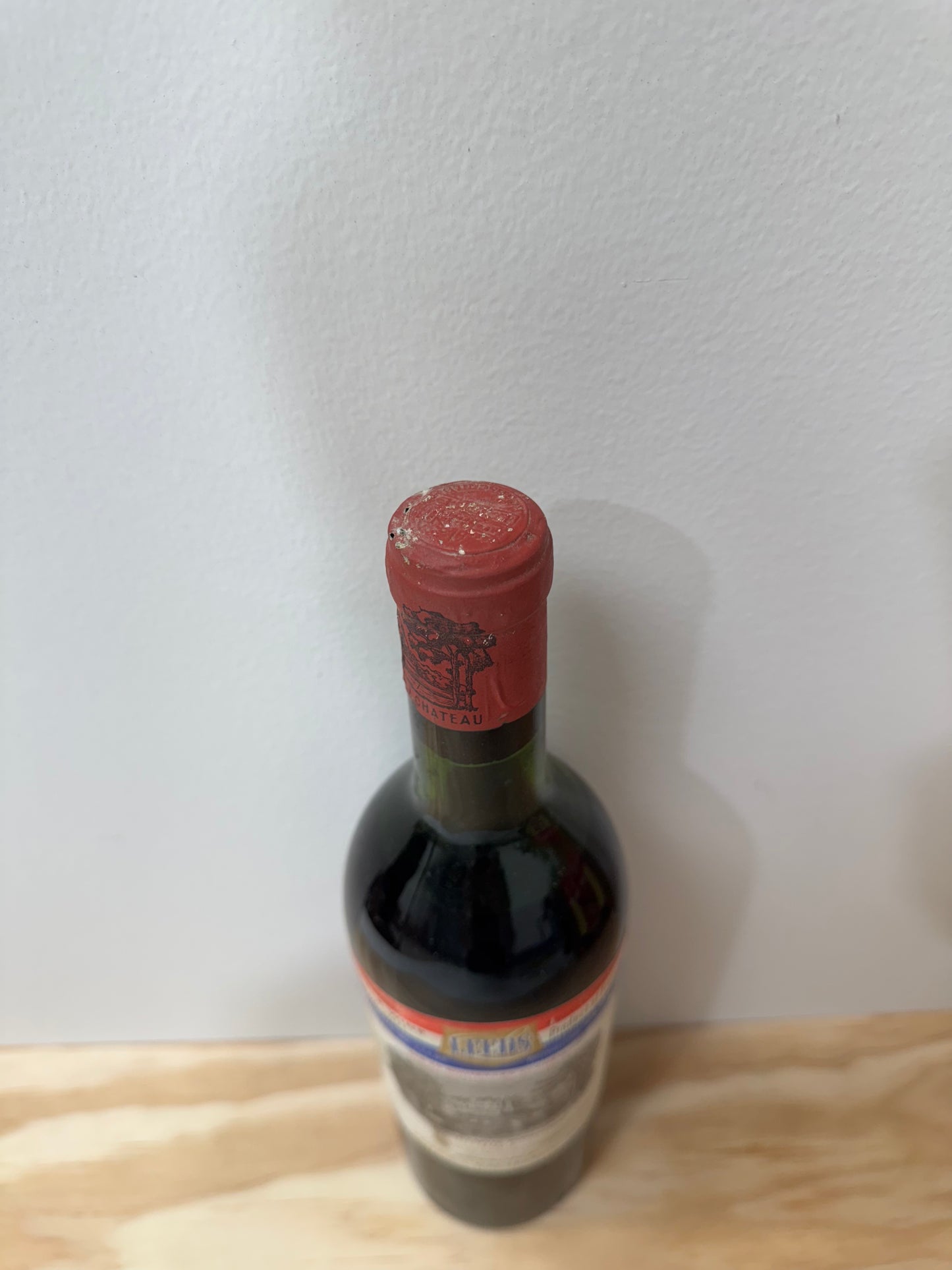 Chateau Lafite 1962 750ml (just below top shoulder)